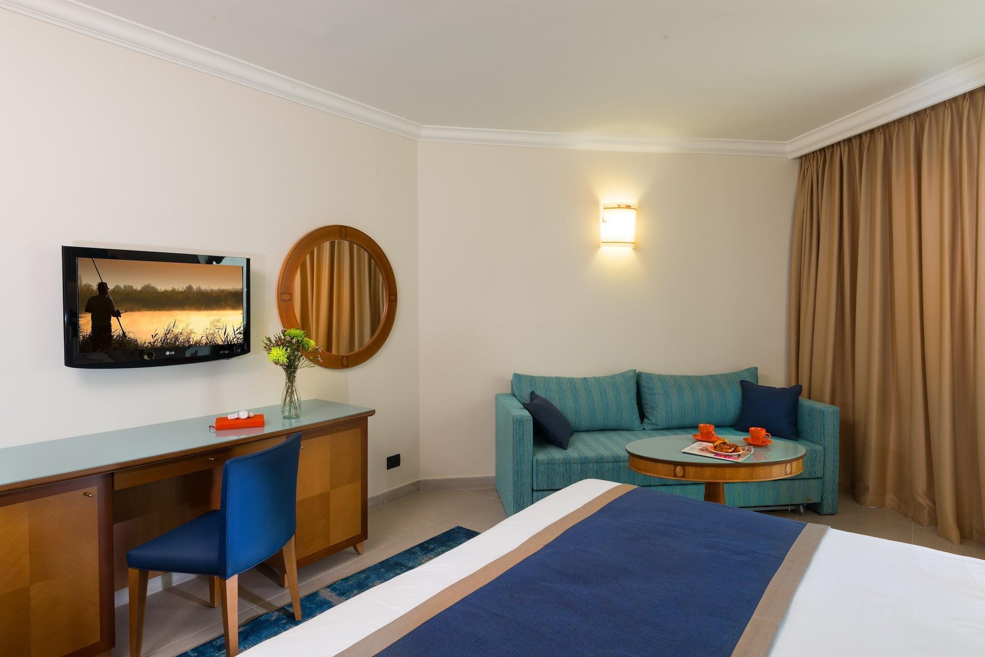 U Magic Palace Эйлат Экстерьер фото A room at the hotel